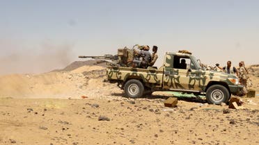 A Yemeni government fighter fires a vehicle-mounted weapon at a frontline position during fighting against Houthi fighters in Marib, Yemen March 28, 2021. Picture taken March 28, 2021. REUTERS/Ali Owidha