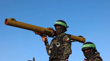 Members of the Ezzedine al-Qassam Brigades, armed wing of the Palestinian Hamas movement, parade in Gaza City on june 7, 2021.