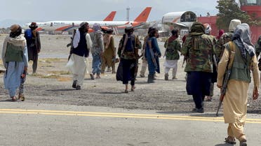Taliban forces patrol at a runway a day after U.S troops withdrawal from Hamid Karzai International Airport in Kabul, Afghanistan August 31, 2021. (Reuters)