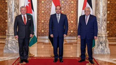 A handout picture released by the Egyptian Presidency on September 2, 2021 shows (L to R) Jordan’s King Abdullah II, Egypt’s President al-Sisi, and Palestinian President Abbas posing together for a group photo during a trilateral summit in Cairo. (Egyptian Presidency/AFP)