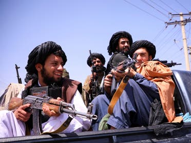 Taliban forces patrol in front of Hamid Karzai International Airport in Kabul, Afghanistan, September 2, 2021. (Reuters)