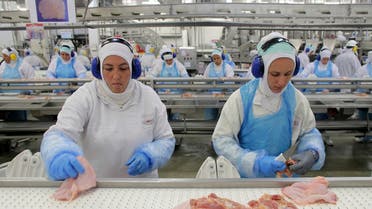In this March 21, 2017 file photo, workers prep poultry at the meatpacking company JBS in Lapa, Brazil. (AP)