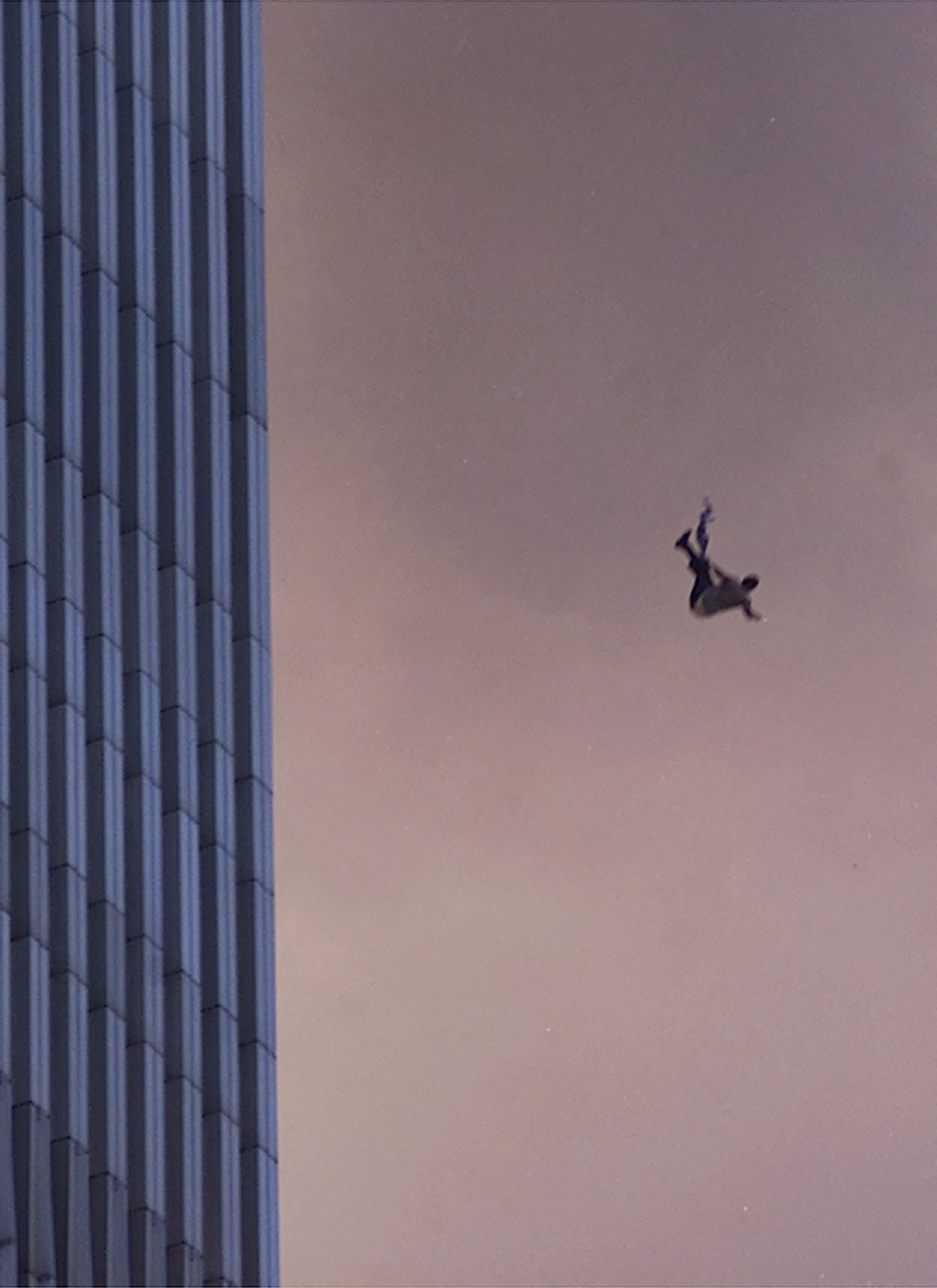 A person falls to his death from the World Trade Center after two planes hit the Twin Towers September 11, 2001 in New York City. (AFP)