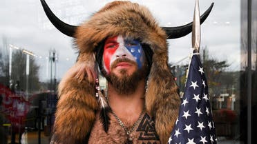 Jacob Anthony Chansley, also known as Jake Angeli, of Arizona, poses with his face painted in the colors of the U.S. flag as supporters of U.S. President Donald Trump gather in Washington, U.S. January 6, 2021. (File Photo: Reuters)