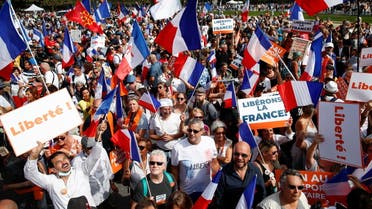 A demonstration against France's restrictions, including a compulsory health pass, to fight the COVID-19 outbreak, in Paris, Sept. 4, 2021. (Reuters)
