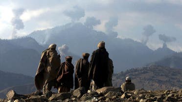 Anti-Taliban Afghan fighters watch several explosions from U.S. bombings in the Tora Bora mountains in Afghanistan in the hunt for al-Qaeda fighters. (File photo: Reuters)