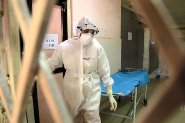 Health officials in full protective gear walk inside an isolation ward of Ernakulam Medical College in Kochi in the Indian southwestern state of Kerala on June 6, 2019. (File photo: AFP)