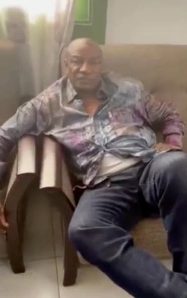 A screen grab from a video shared on social media, but not yet authenticated, claimed to show Guinea's President Alpha Conde detained by army special forces, in Conakry, Guinea September 5, 2021. (Video obtained by Reuters on September 5, 2021.)