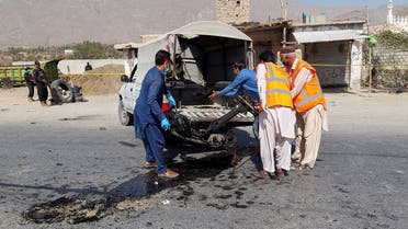 Members of the crime investigation team remove the wreckage from the site after a suicide blast on paramilitary force checkpoint in Quetta, Pakistan September 5, 2021. (Reuters)