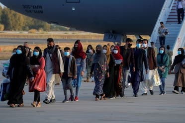 Afghan citizens, who have been evacuated from Kabul, disembark from a U.S Air Force transport plane as they arrive at Naval Station (NAVSTA) Rota Air Base in Rota, southern Spain, August 31, 2021. (File photo: Reuters)
