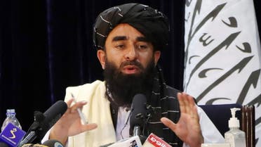 Taliban spokesman Zabihullah Mujahid speaks during a news conference in Kabul, Afghanistan August 17, 2021. REUTERS/Stringer NO RESALES. NO ARCHIVES