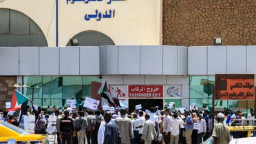 Sudanese aviation professionals rally in support of civilian rule at Khartoum airport in the capital on May 27, 2019. (AP)