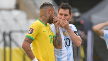 Brazil's Neymar (L) and Argentina's Lionel Messi talk before their South American qualification football match for the FIFA World Cup Qatar 2022 at the Neo Quimica Arena, also known as Corinthians Arena, in Sao Paulo, Brazil, on September 5, 2021. (AFP)
