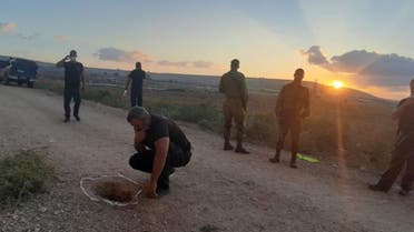 Israeli police look at a tunnel which Palestinian prisoners used to escape a high-security jail. (Twitter)