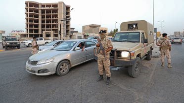 Libyan soldiers man a checkpoint southeast of the capital Tripoli, on September 4, 2021, after clashes near the Tekbali barracks, the headquarters of 444 Brigade. (Mahmud Turkia/AFP)