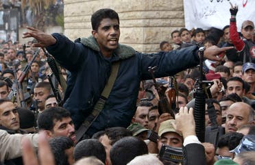 West Bank commander of the militant Al Aqsa Martyrs Brigades Zakaria Zubeid is carried on the shoulders of supporters in Jenin. (Reuters)