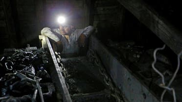 A miner works at the Progress coal mine near the rebel-controlled city of Torez in Donetsk Region, Ukraine. (Reuters)