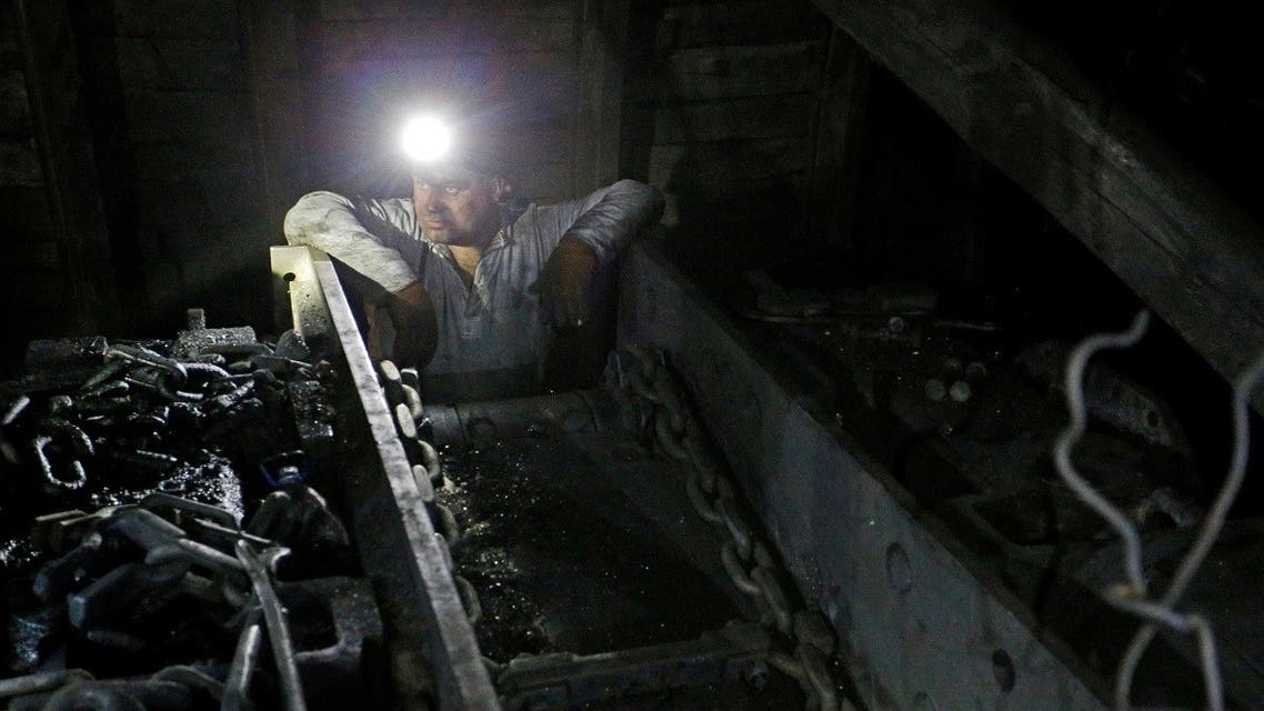 A miner works at the Progress coal mine near the rebel-controlled city of Torez in Donetsk Region, Ukraine. (Reuters)