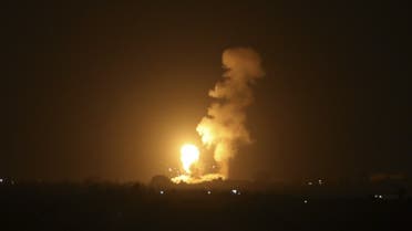A fireball rises following an air strike in Khan Yunis in the southern Gaza Strip, late on September 6, 2021. (AFP)