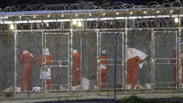 In this file photo taken on March 4, 2002, detainees at Camp X-Ray in Guantanamo Bay, Cuba. (AFP)