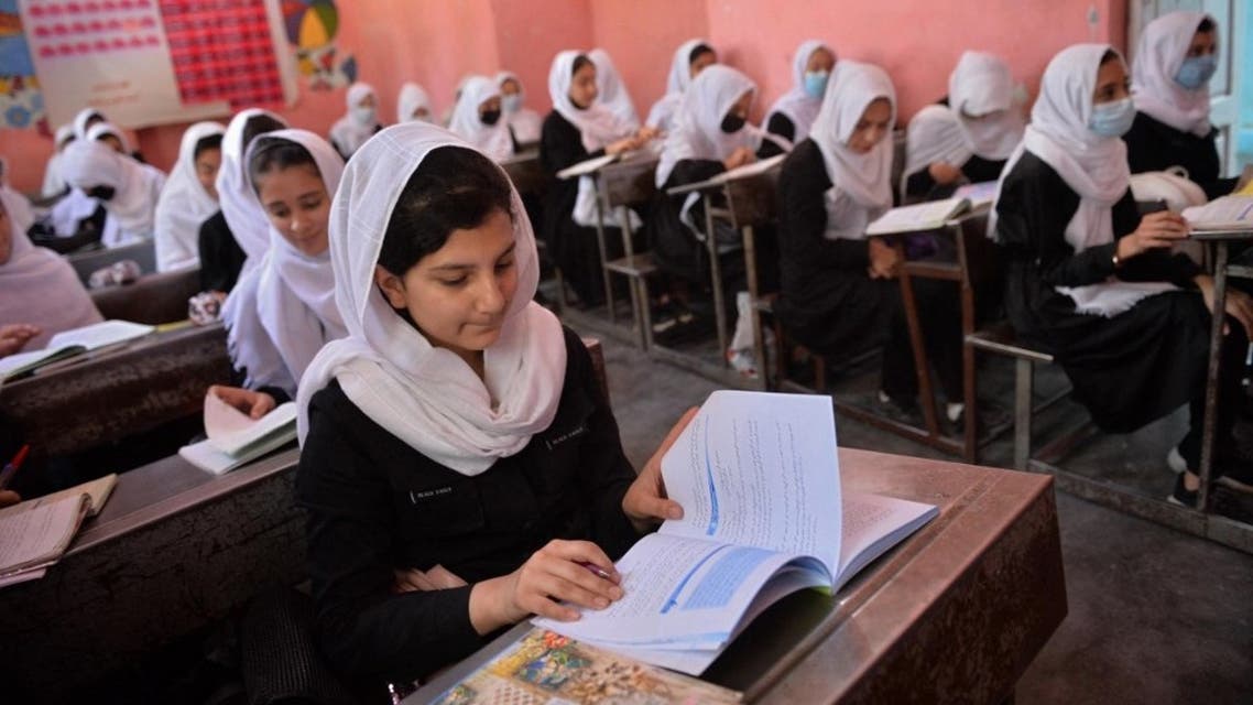 Girls attend their class at a school in Herat on May 9, 2021. (AFP)