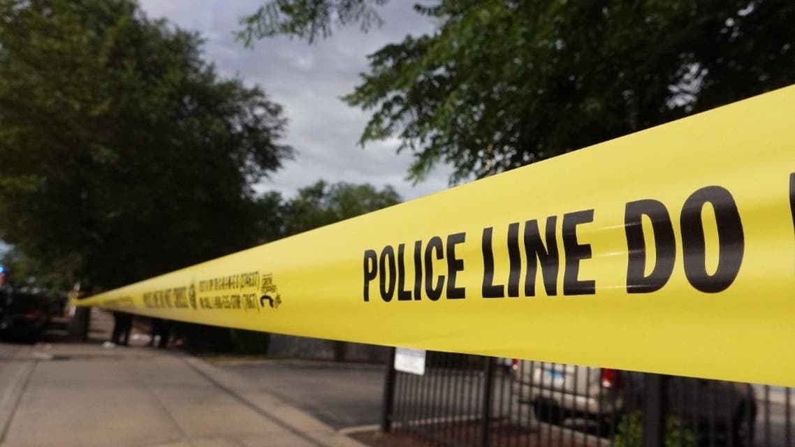 Police tape surrounds a crime scene where three people were shot at the Wentworth Gardens housing complex in the Bridgeport neighborhood on June 23, 2021 in Chicago. (AFP)