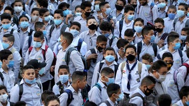 Students wearing protective masks attend the first day at Al Sadeeya school, following months of closure due to the coronavirus disease (COVID-19) outbreak in Cairo, Egypt October 17, 2020. (File photo: Reuters)