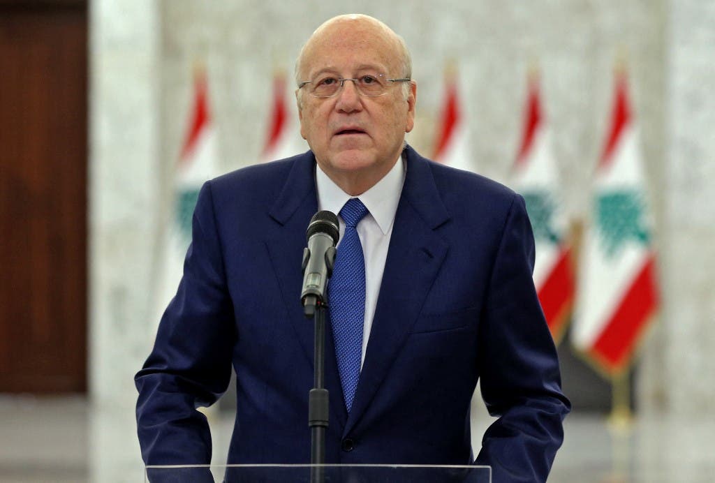 A handout picture provided by the Lebanese photo agency Dalati and Nohra on September 10, 2021 shows Prime Minister-designate Najib Mikati announcing the formation of a new Lebanese government. (AFP)