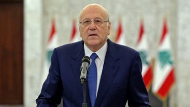 A handout picture provided by the Lebanese photo agency Dalati and Nohra on September 10, 2021 shows Prime Minister-designate Najib Mikati announcing the formation of a new Lebanese government. (AFP)