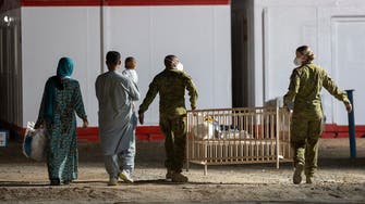 Traumatized and anxious, Afghans evacuees begin life in Australia 