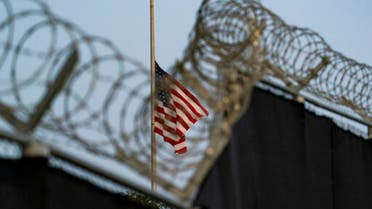 A flag flies at half-staff as seen from Camp Justice in Guantanamo Bay Naval Base, Cuba. (File photo: AP)