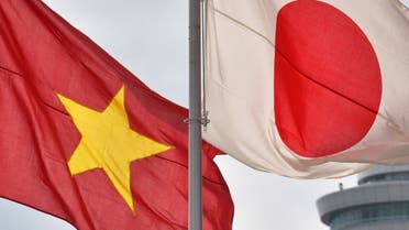 The national flags of Japan (R) and Vietnam are seen at Tokyo's Haneda Airport on February 28, 2017.  (AFP)