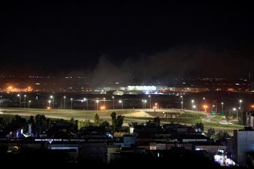 دخان يتصاعد اثر استهداف مطار اربيل في فبراير الماضي