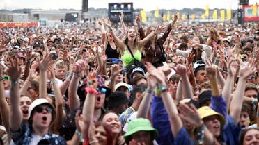 Festival goers watch British band Easy Life perform on the main stage at Reading Festival, in Reading, Britain, August 28, 2021. (File photo: Reuters)