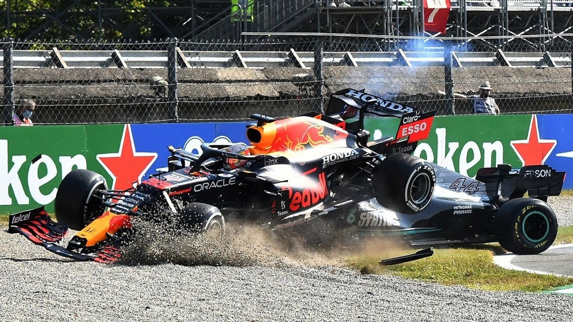 Red Bull's Max Verstappen and Mercedes' Lewis Hamilton crash out of the race. (Reuters)