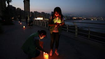As Lebanon’s crises weigh heavy, people light candles in suicide prevention walk