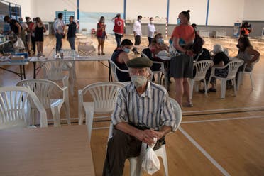 A man from a neighboring town stays at a sports center in Ronda after being evacuated from his home due to a big wildfire in the region, on September 12, 2021. (Jorge Guerrero/AFP)