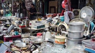 Afghans sell belongings at Kabul bazaars in attempt to fund their escape