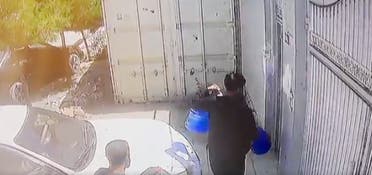 Security footage of aid worker Zemari Ahmadi loading water containers into his truck on the day that he was struck by a US military drone after being suspected of loading an ISIS bomb into his vehicle in Kabul, Afghanistan. (Screengrab)