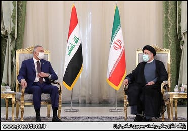 Iran's President Ebrahim Raisi meets Iraq's Prime Minister Mustafa al-Kadhimi in Tehran, Iran, September 12, 2021. (Reuters)
