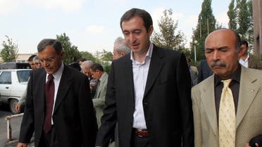 A file photo shows Tuncer Bakirhan, former leader of a now defunct pro-Kurdish People’s Democracy Party, or DEHAP, center, and other party members leave a courthouse after their trial in Ankara, Sept. 26, 2006. .(AP/Burhan Ozbilici)
