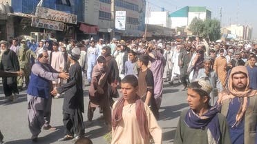 People hold a protest march against the Taliban's decision to force them to leave their homes in Kandahar, Afghanistan September 14, 2021, in this still image taken from video. (ASVAKA News Agency/Handout via Reuters)