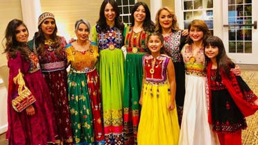 Afghan women share images of themselves dressed in their bright and colorful national attire on social media. (Twitter/DrFatimaKakkar)