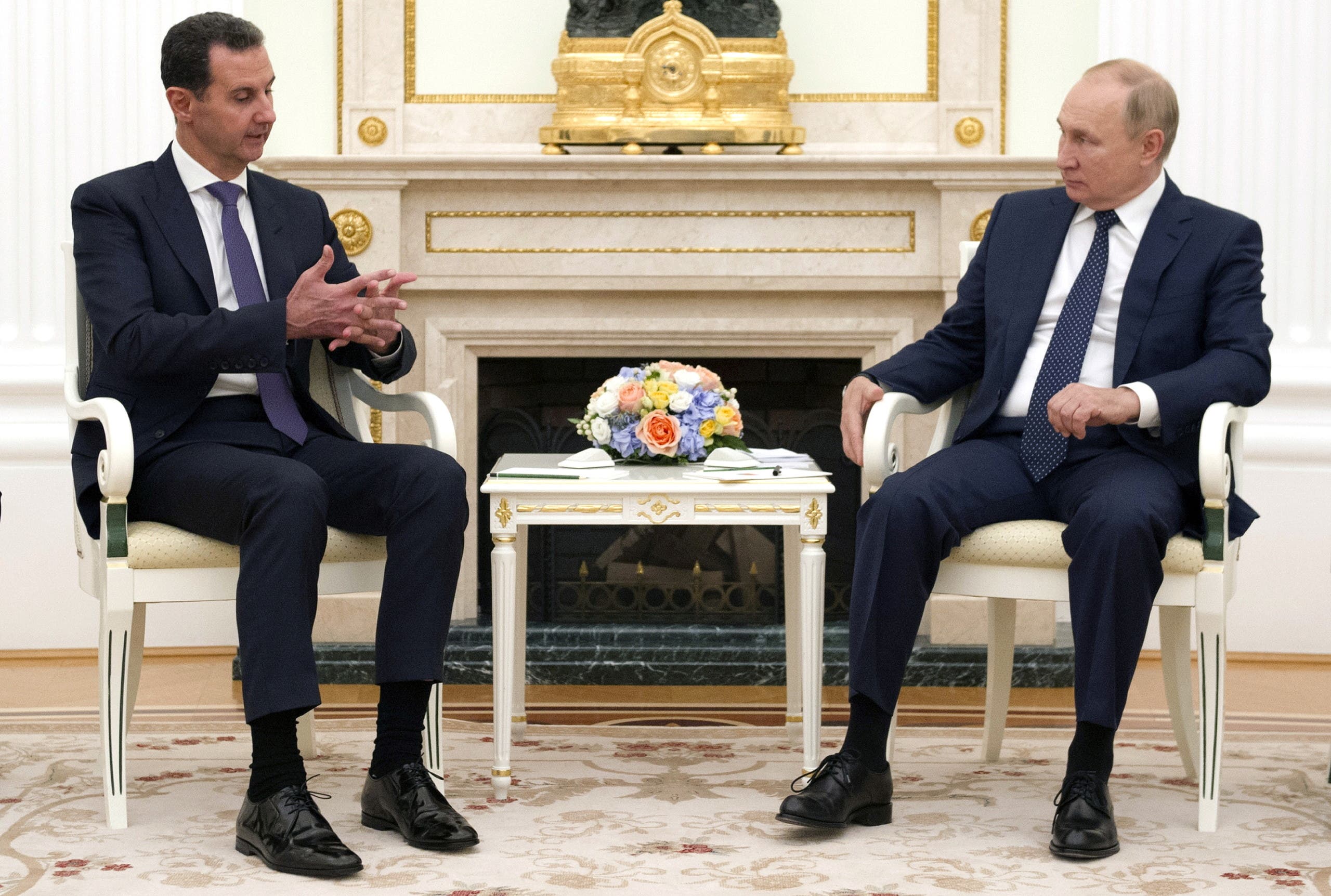 Russian President Vladimir Putin attends a meeting with Syrian President Bashar al-Assad at the Kremlin in Moscow, Russia, September 13, 2021. Picture taken September 13, 2021. (Reuters)