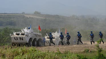 Chinese soldiers take part in the multinational UN peacekeeping live exercise “Shared Destiny-2021” held by Chinese military at a tactical training base of the Chinese People’s Liberation Army in Zhumadian, central China’s Henan province on September 15, 2021. (Jade Gao/AFP)