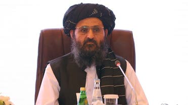 In this file photo taken on July 18, 2021 the leader of the Taliban negotiating team Mullah Abdul Ghani Baradar looks on the final declaration of the peace talks between the Afghan government and the Taliban presented in Qatar's capital Doha. (AFP)
