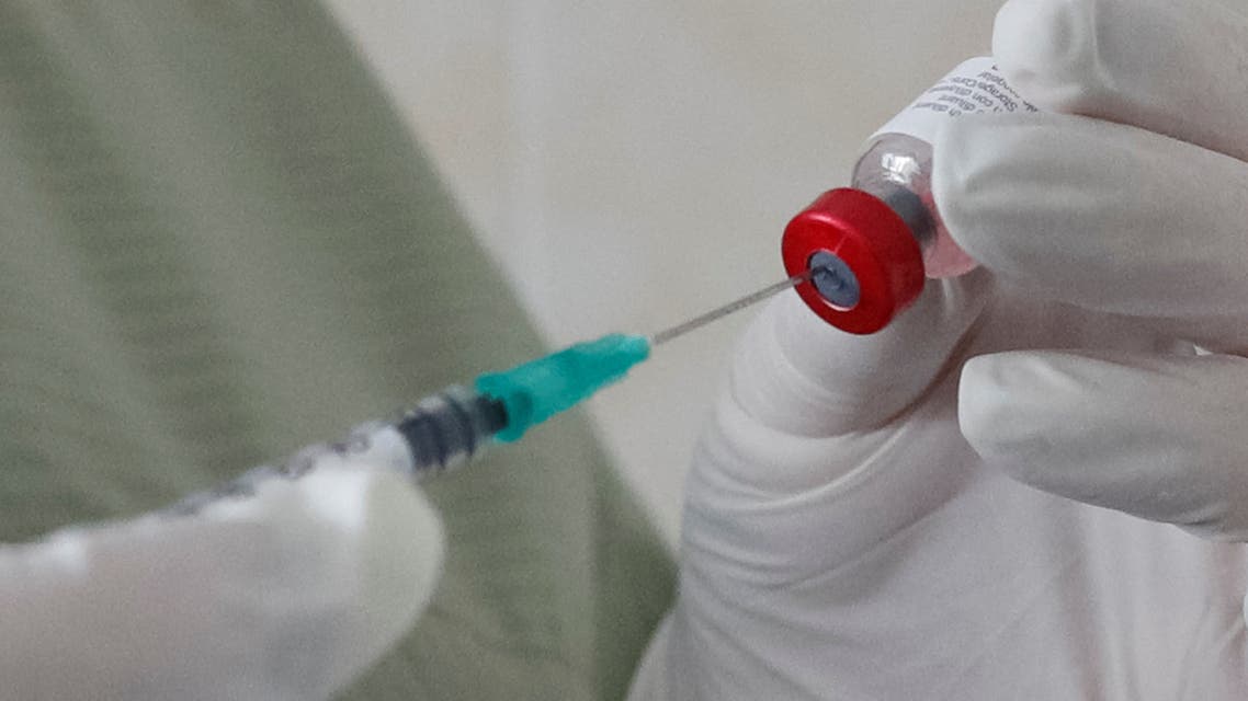 A nurse fills a syringe with a vaccine before administering an injection at a kids clinic in Kiev, Ukraine August 14, 2019. (Reuters)