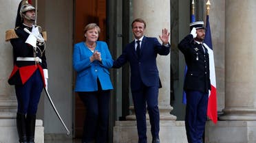 French President Emmanuel Macron welcomes German Chancellor Angela Merkel in Paris, Sept. 16, 2021. (Reuters)