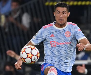 Manchester United's Portuguese striker Cristiano Ronaldo (R) celebrates with Manchester United's English striker Jadon Sancho after scoring a goal during the UEFA Champions League Group F football match between Young Boys and Manchester United at Wankdorf stadium in Bern, on September 14, 2021. (File photo: AFP)