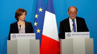 French Minister for Foreign Affairs Jean-Yves Le Drian and French Minister of the Armed Forces Florence Parly make an official statement in the press room at the Elysee Palace, in Paris, France, April 14, 2018. (File photo: Reuters)